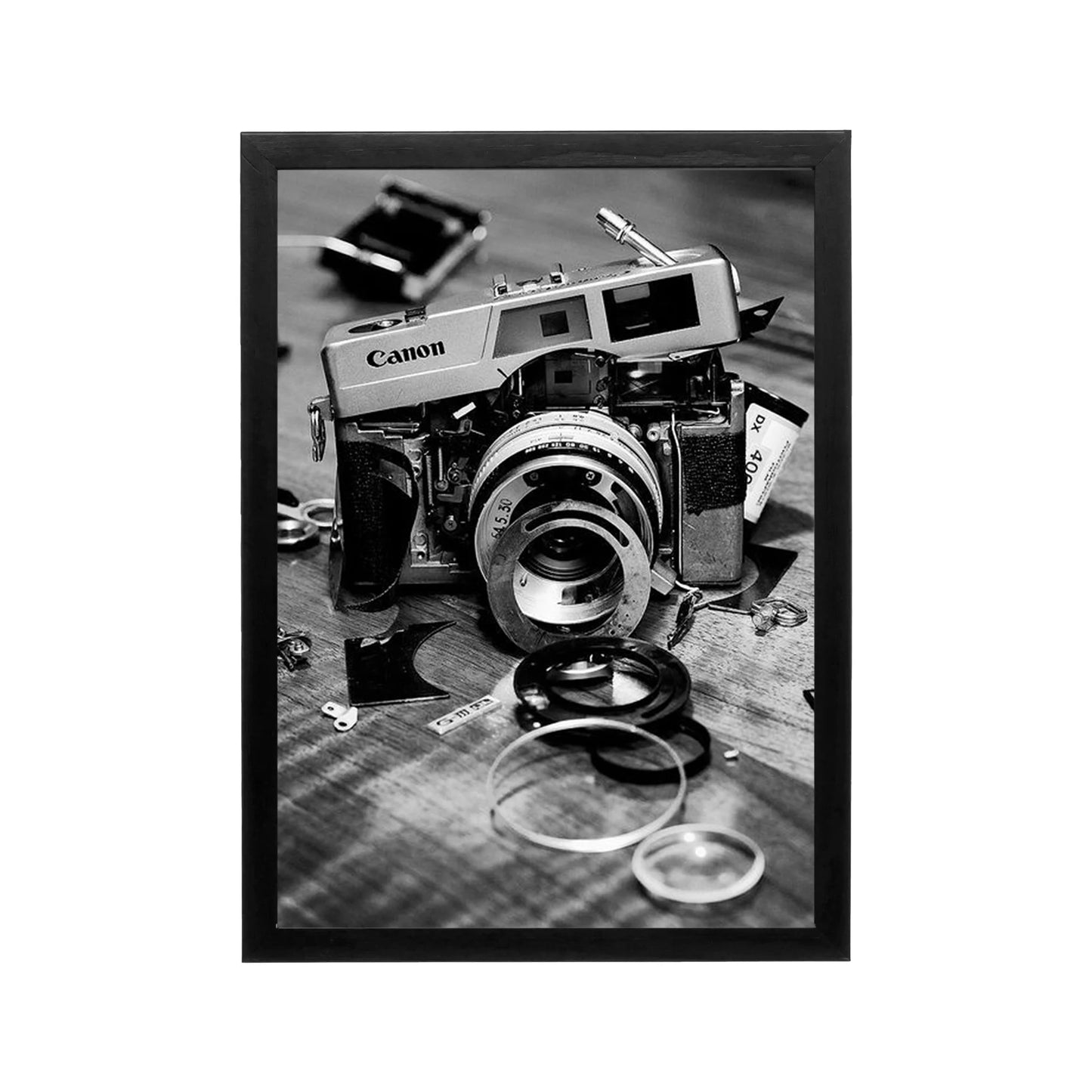 Black and white Canon camera still life with lenses and parts, editorial monochrome wall art for modern interiors