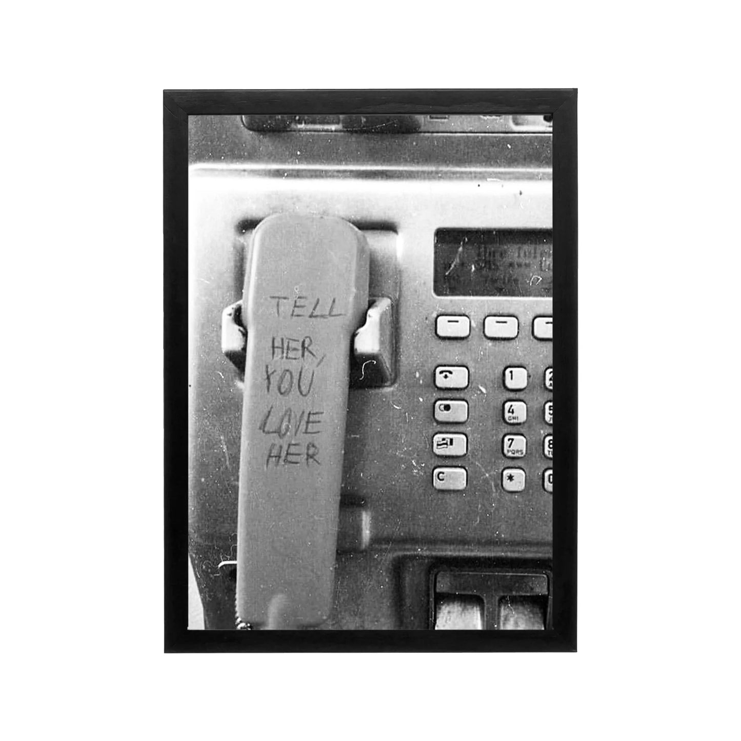 Black and white framed pay phone with handwritten note, grainy monochrome editorial print for modern wall art