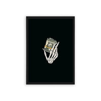 Money 'Skeletal Cash' Framed Poster Black Hard Fiber Skeletal hand holding a wad of cash framed as a poster against a dark background.