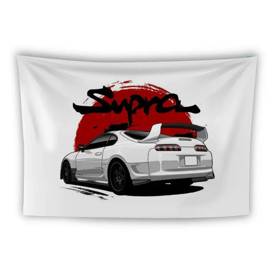 A white sports car with a prominent rear spoiler is depicted against a red circular background. The word "Supra" is written in black, stylized graffiti font above the car. The image appears on a white rectangular cloth or tapestry.