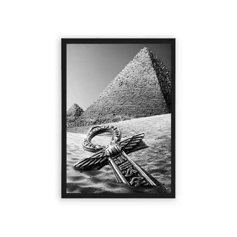 Ancient Egyptian 'Pyramid's Key' Framed Poster Black Hard Fiber A monochromatic photograph featuring the iconic great pyramid of giza with an ornate metallic key lying on the sand in the foreground, symbolically uniting ancient wonders with elements of mystery and discovery.