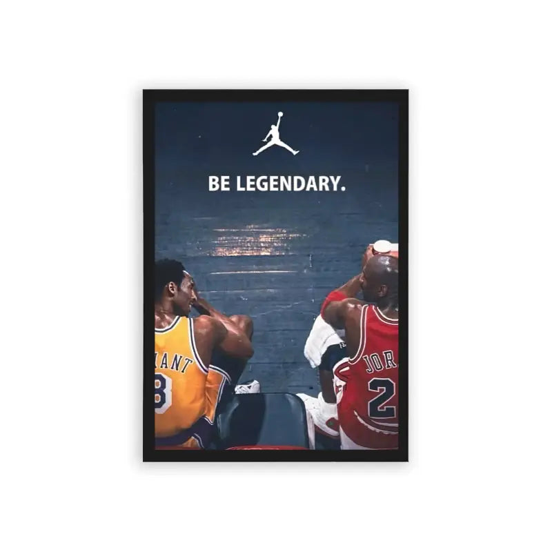 Basketball 'Legendary Jump' Framed Poster Black Hard Fiber An iconic sports moment captured with two legendary basketball players in their team jerseys, set against a star-studded skyline, urging viewers to 'be legendary' beneath the famous jumpman logo. This moment is