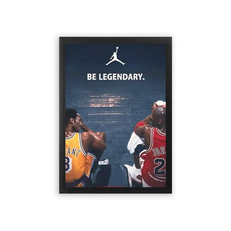 Basketball 'Legendary Jump' Framed Poster Black Premium Wood An iconic sports moment captured with two legendary basketball players in their team jerseys, set against a star-studded skyline, urging viewers to 'be legendary' beneath the famous jumpman logo. This moment is