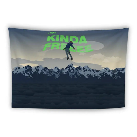 A person is depicted mid-jump against a backdrop of snow-capped mountains under a cloudy sky. Green text above the person says "I FEEL KINDA FREEZE." The image conveys a sense of freedom and chilliness in a mountainous setting.