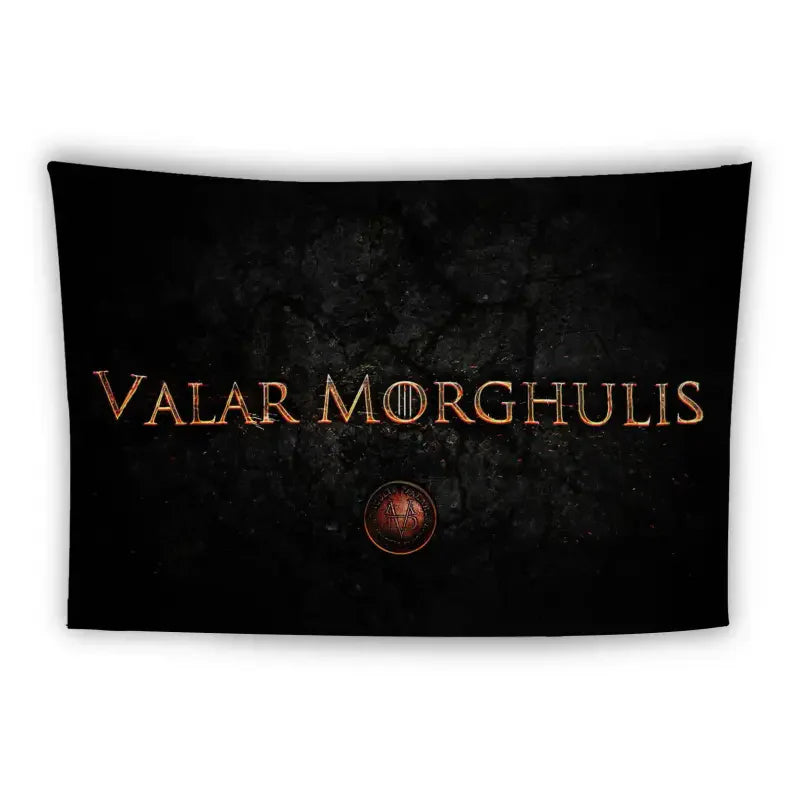 A black tapestry displays the phrase "Valar Morghulis" in large, gold letters with a dark, textured background. Below the text, there's a circular seal featuring intricate designs.