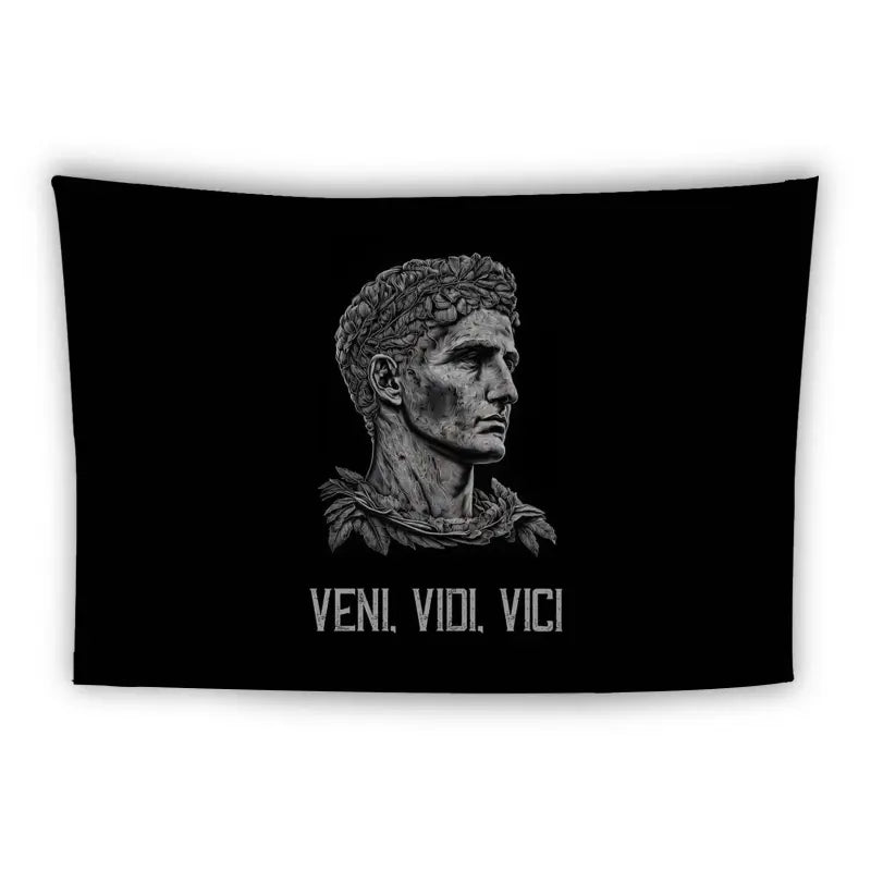 A black tapestry featuring a grayscale bust of a Roman figure wearing a laurel wreath, with the classical Latin phrase "VENI. VIDI. VICI" written in bold white letters beneath. The background is plain black, highlighting the central illustration and text.