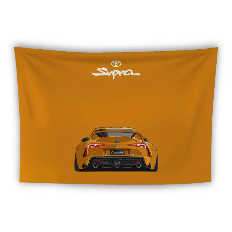 A tapestry featuring a rear view of an orange Toyota Supra sports car, showcasing its sleek design. Above the car, the "Supra" logo is prominently displayed in white. The background is a matching orange color.