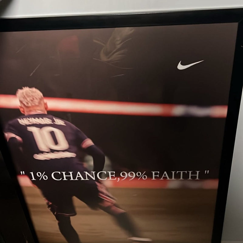 A framed football poster