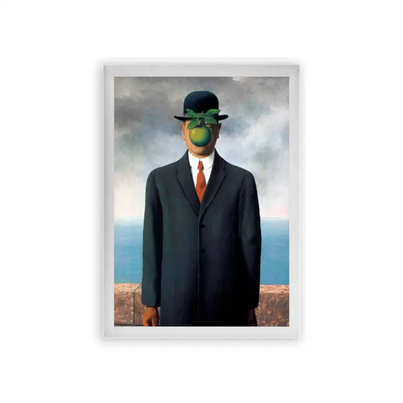 Surreal 'Apple Of My Eye' Framed Poster White Premium Wood A surrealist artwork featuring a man in a suit with an apple obscuring his face, set against a backdrop of a cloudy sky and ocean horizon.