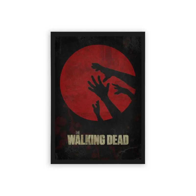 The Walking Dead 'Grips of the Undead' Framed Poster Black Hard Fiber The image is a poster for the tv series "the walking dead." it features a dark silhouette of a group of hands reaching upwards against a backdrop of a red circle, suggesting a sense of horror and desperation, which is fitting for the show's zombie apocalypse theme.