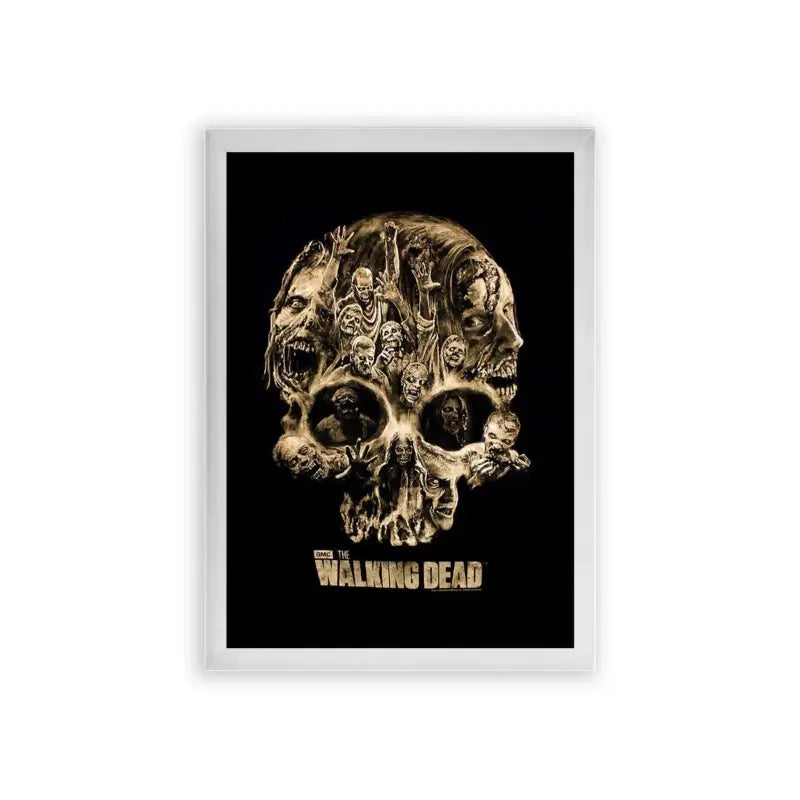 The Walking Dead 'Decay and Despair' Framed Poster White Premium Wood A stylized poster featuring a skull composed of various grotesque figures and faces with the title "walking dead" on the bottom, evoking themes of horror and the undead.