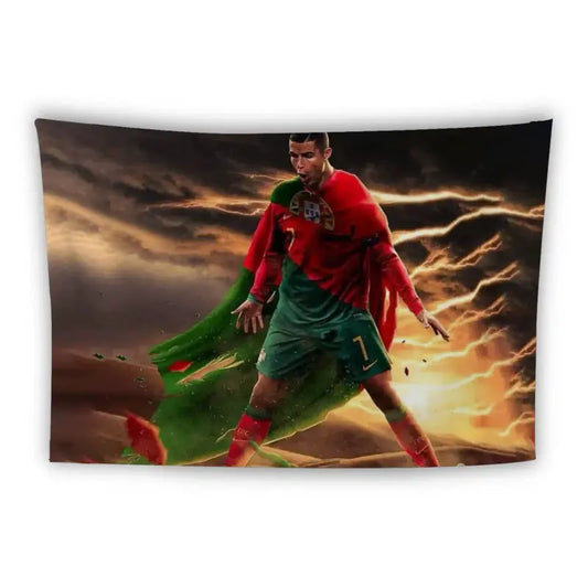 A male soccer player is depicted in a dramatic scene with a stormy sky and lightning. He is wearing a red and green uniform, with a cape flowing behind him, giving a superhero-like appearance. The intense background adds a dynamic and powerful effect.