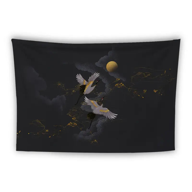 A wall tapestry featuring two white cranes with golden accents in their wings flying against a dark background. The backdrop includes a full moon and swirling gold and black abstract elements, creating a night scene.