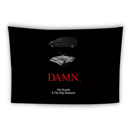 A black tapestry featuring a dark van at the top, a crack forming an abstract shape in the middle, and the word "DAMN." in bold red text below it. Underneath "DAMN." is the text "Mr. Morale & The Big Steppers" in smaller white text.