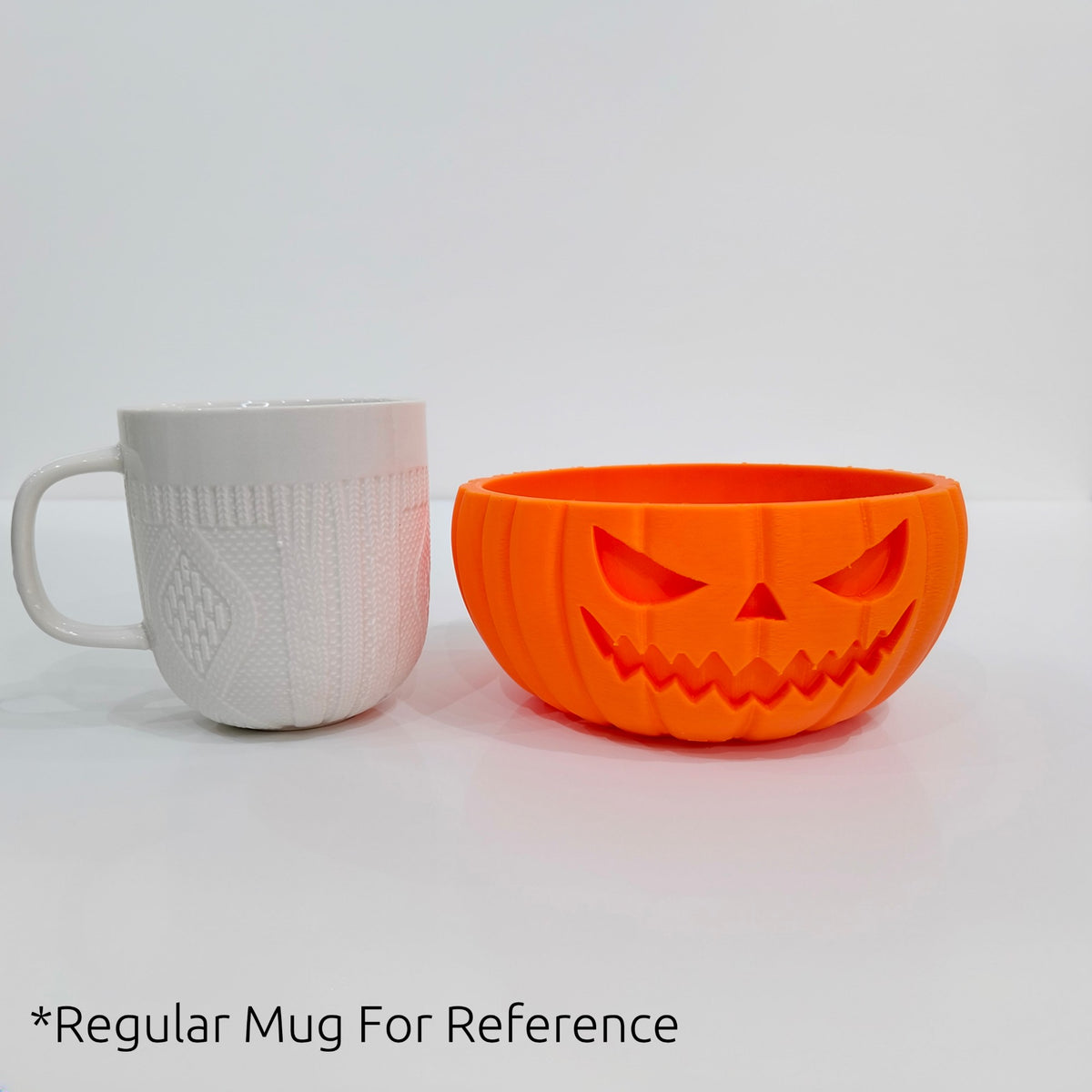 Pumpkin bowl next to a regular mug for size: 13 cm across, 7 cm tall
