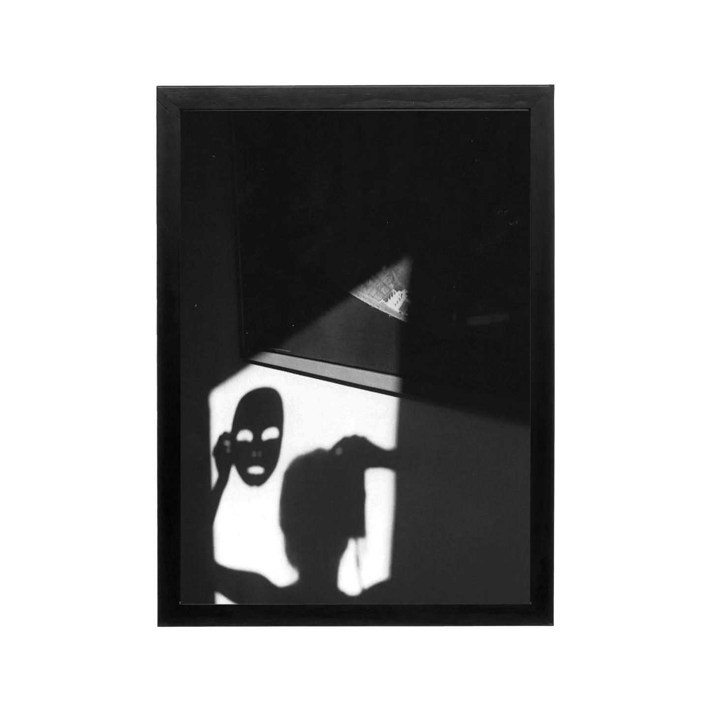Black and white abstract shadow figure print with high contrast tonal range for minimalist modern wall decor