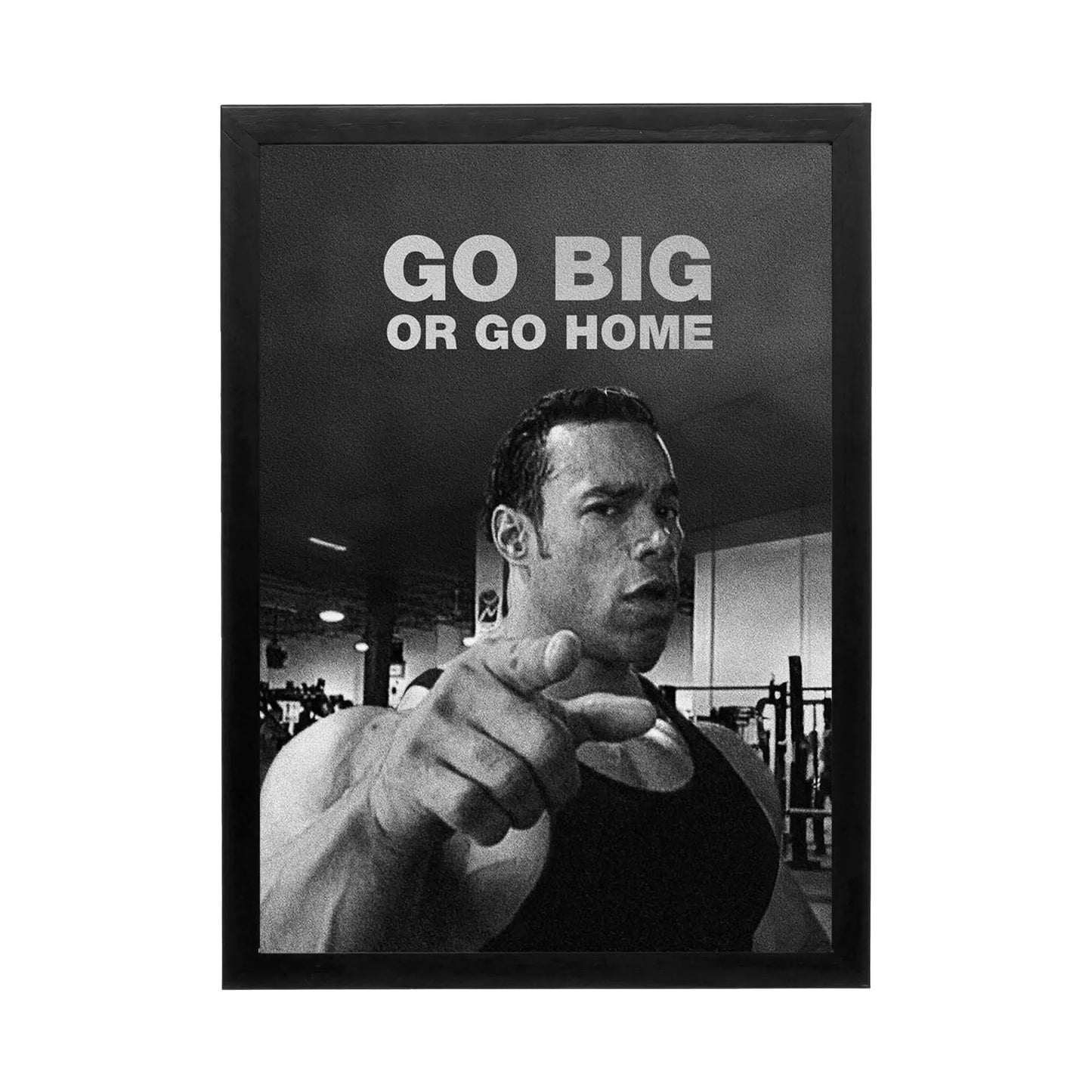 Black and white wall art showing a muscular figure pointing, dramatic lighting for a high-performance gym or office atmosphere.