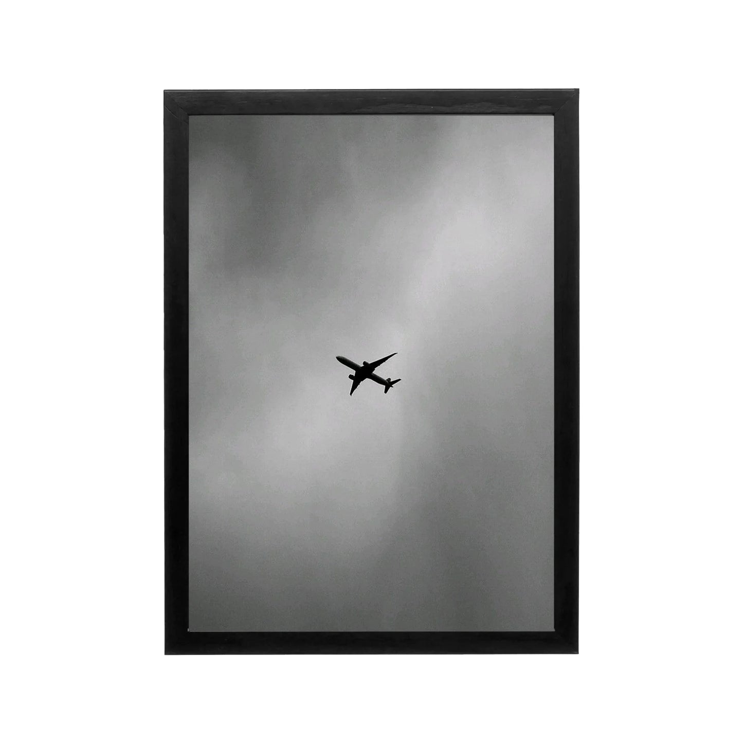 Black plane silhouette in grey sky, minimalist monochrome wall art for modern living room or office