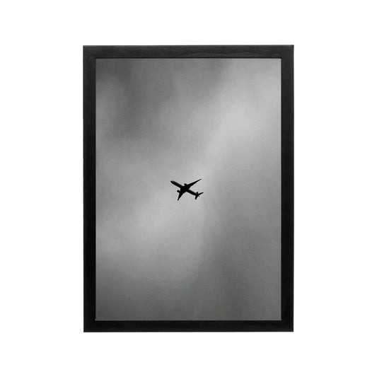 Black plane silhouette in grey sky, minimalist monochrome wall art for modern living room or office