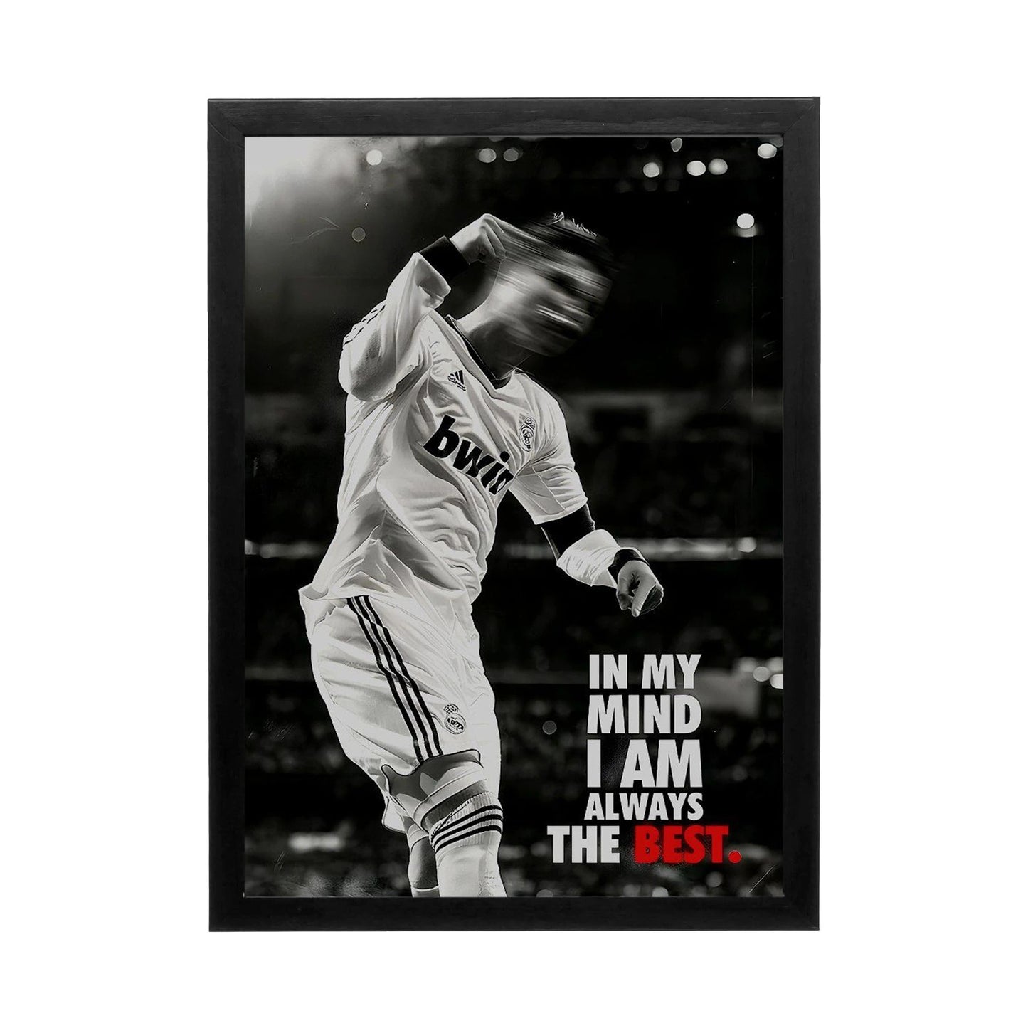 Black and white wall art featuring a dynamic soccer pose, ideal for a high-energy workspace.