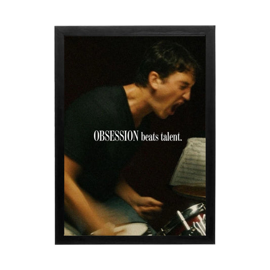 Dynamic wall art of a drummer in action with bold text about obsession and talent for a creative workspace.