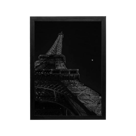 Black and white Eiffel Tower print with dramatic contrast and minimalist framing for modern living room or hallway