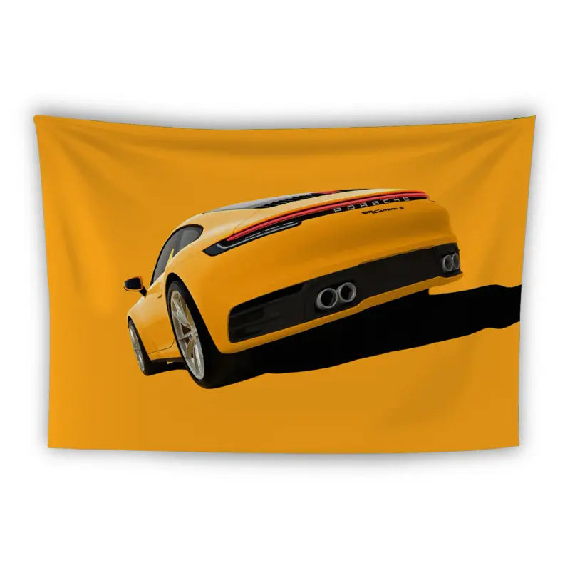 A tapestry featuring a yellow sports car, viewed from the rear at an angle against a matching yellow background. The car has sleek lines, red taillights, and four exhaust pipes. The stylish and dynamic design of the car stands out prominently.